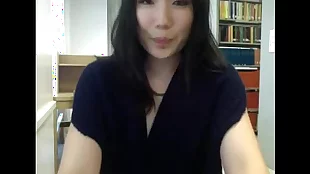 Asian couple experiences intense pleasure on webcam