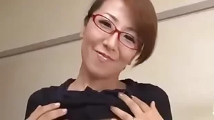 Japanese MILF and young boys engage in steamy sex