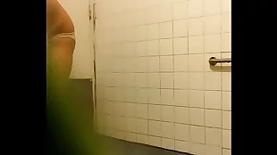 Mature Asian wife films herself showering in selfie video