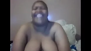Amateur Ebony Mature Flashes Tits on Webcam